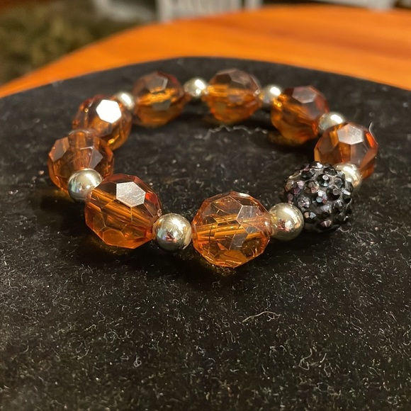 8” stackable stretch bracelet with 8 amber color & 9 silver tone beads - Picture 5 of 13